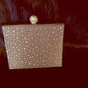 Compact evening clutch.